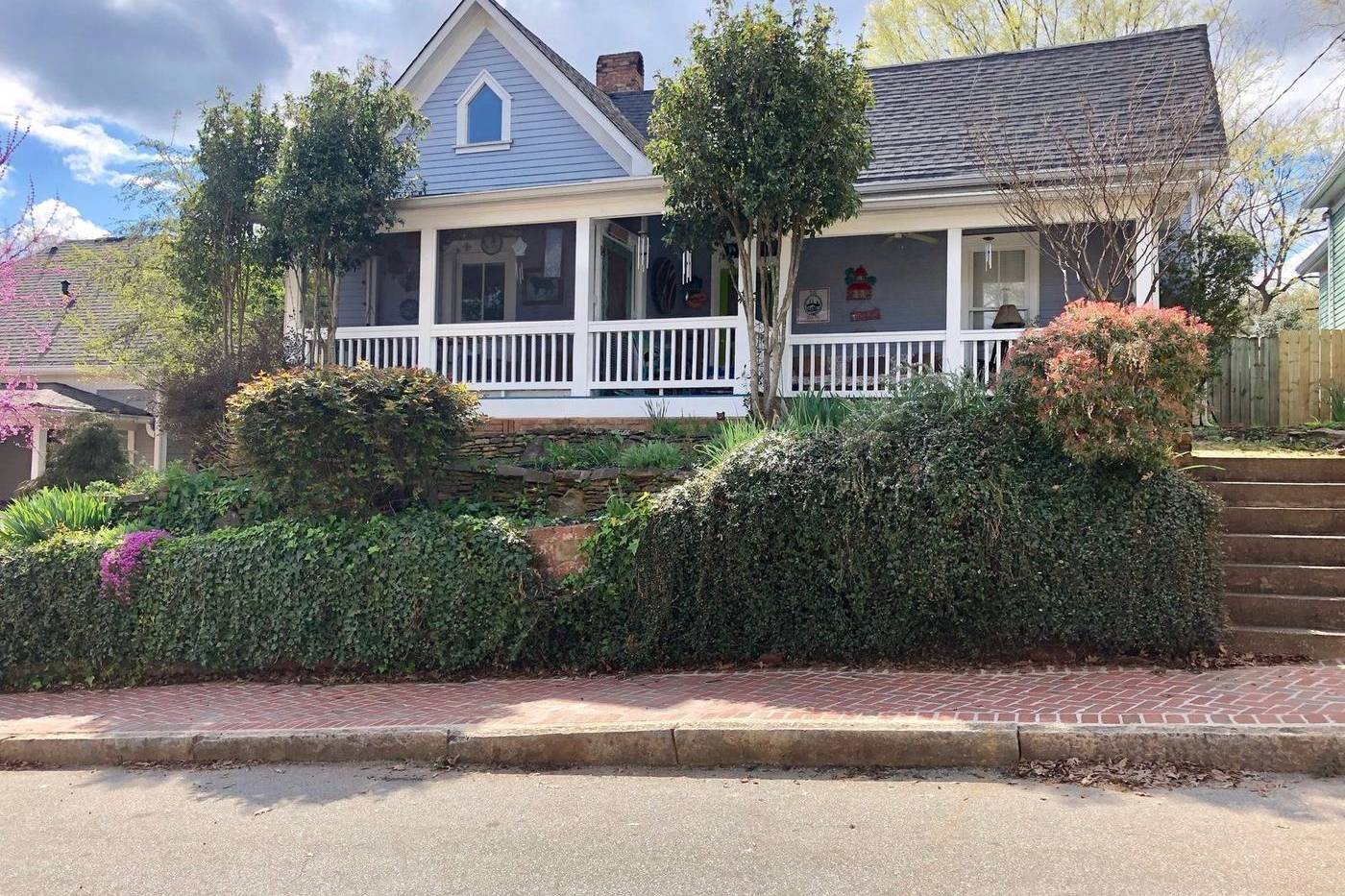 A house with a long porch on Tye Street, Cabbagetown, Atlanta